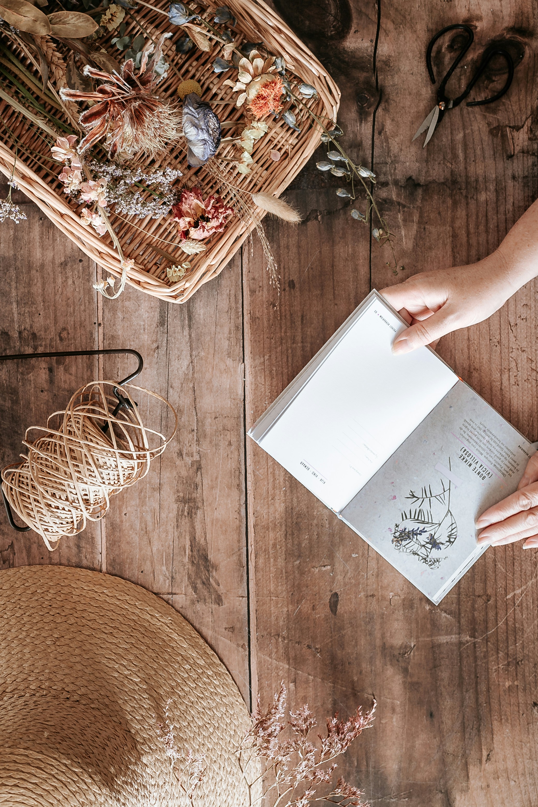 person holding white printer paper