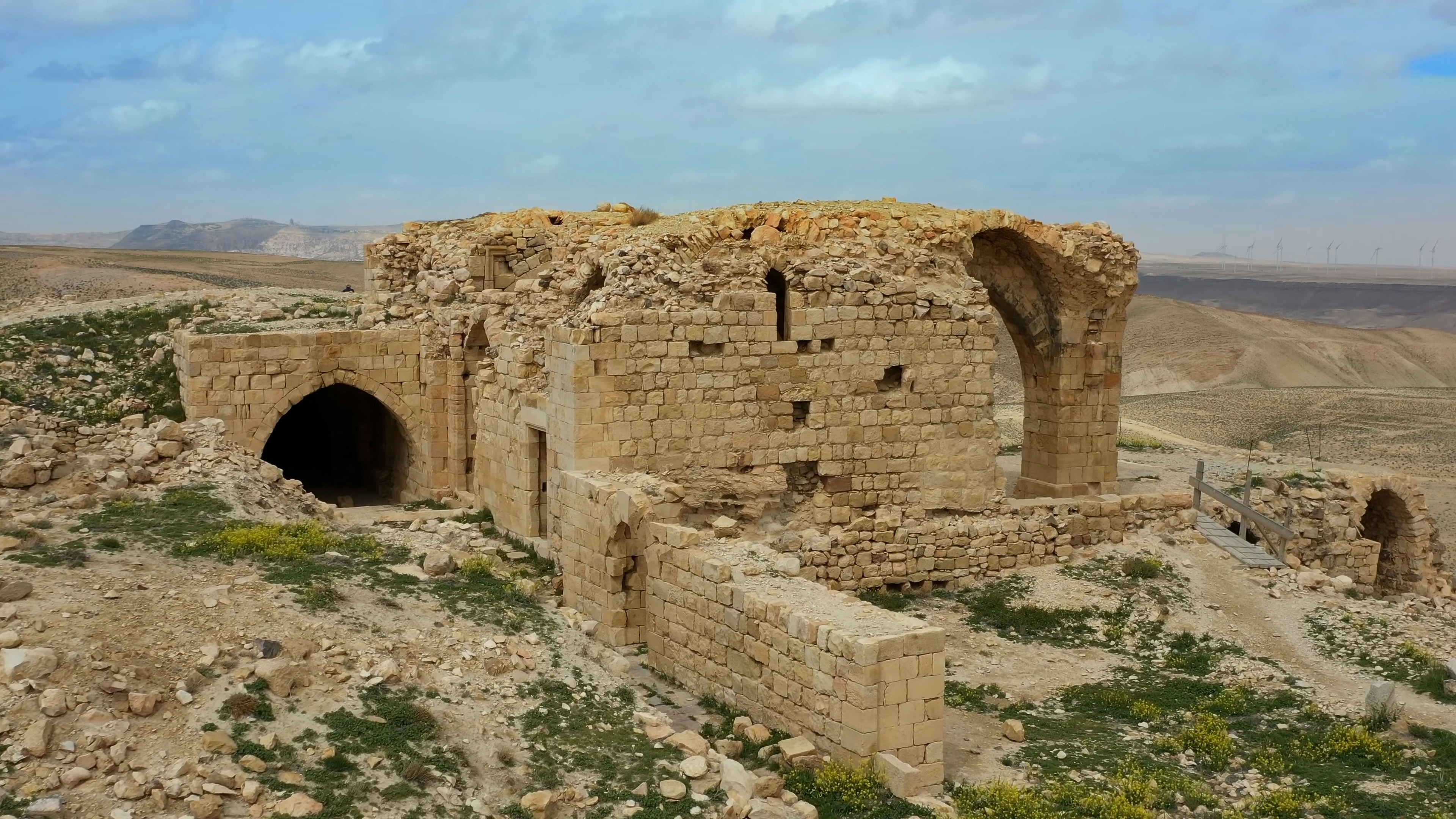 brown brick ruins under blue sky during daytime