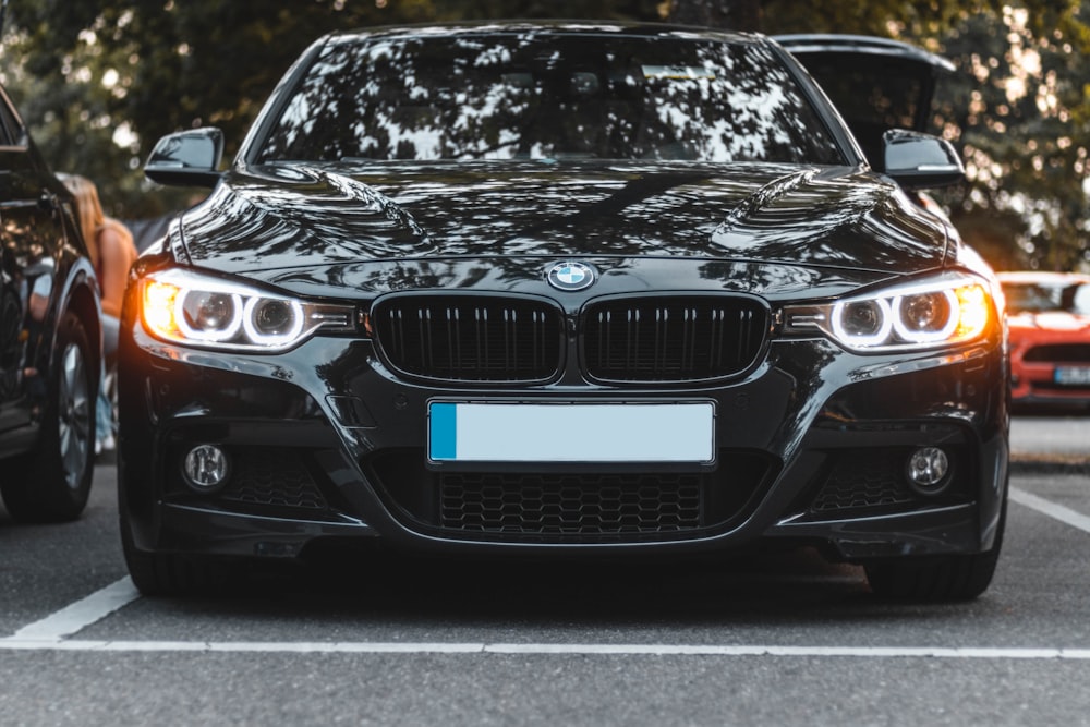 black bmw m 3 on road