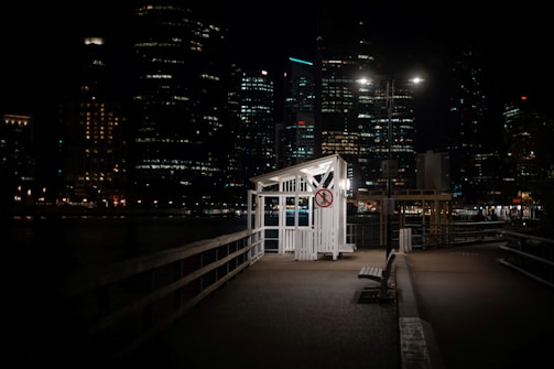 A warmly lit shelter providing a safe place for homeless individuals to rest.