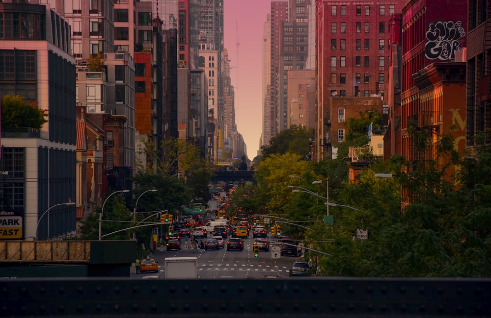 a city street filled with lots of tall buildings