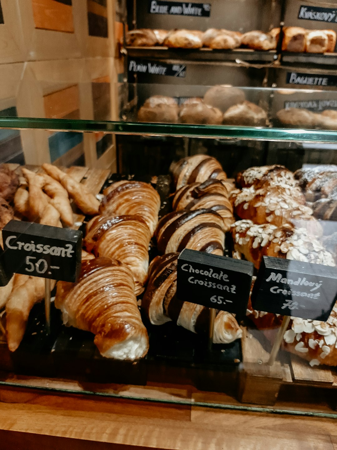 brown bread on clear glass display counter