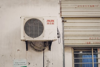 white and gray window type air conditioner