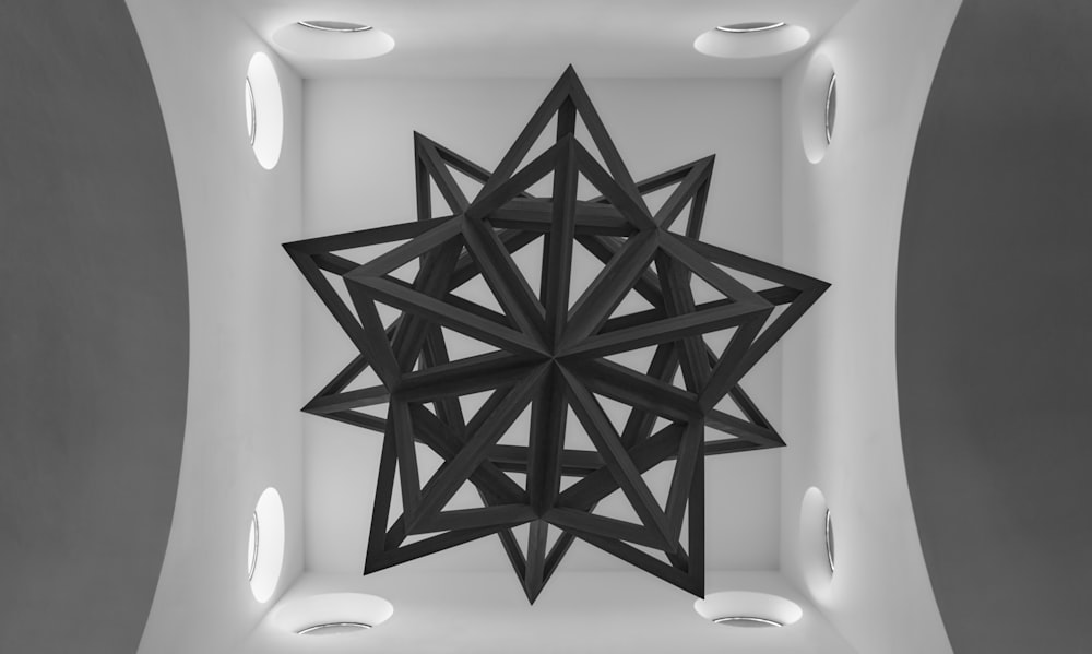 decoração de parede de estrela de madeira preta e branca
