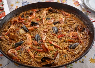 cooked food on black round plate