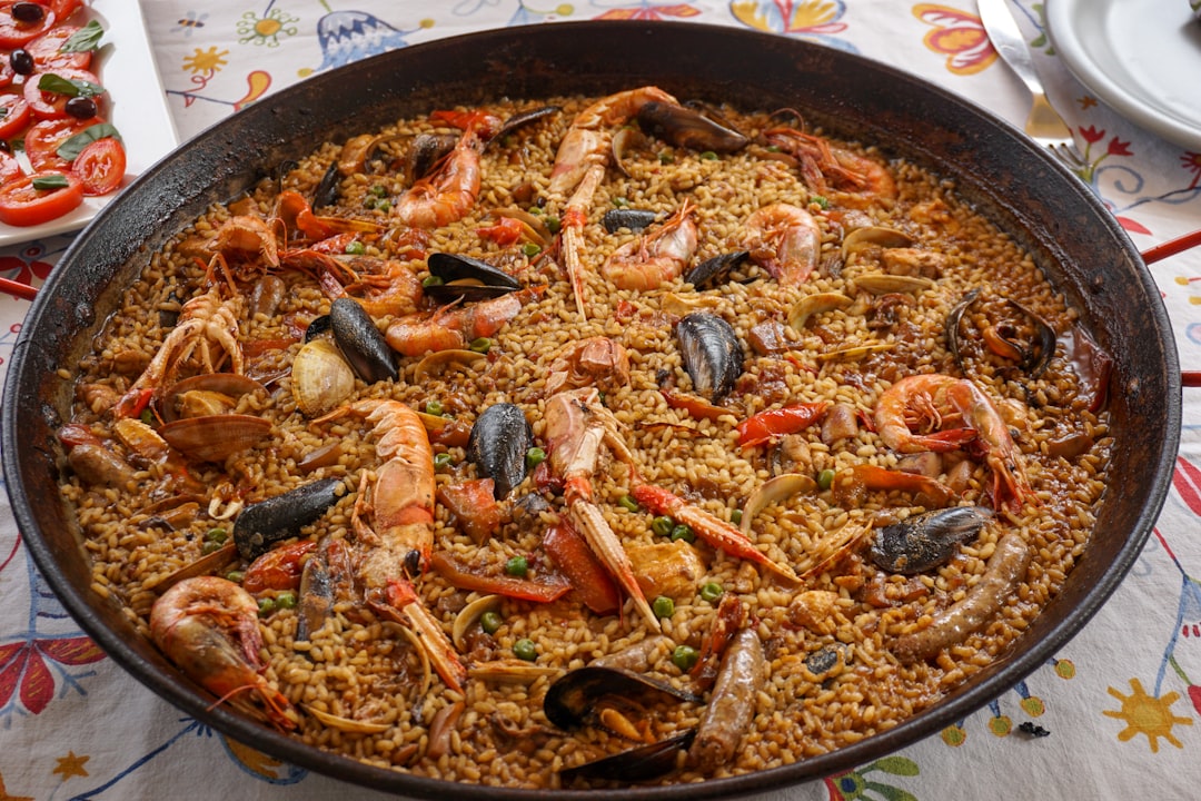 cooked food on black round plate,