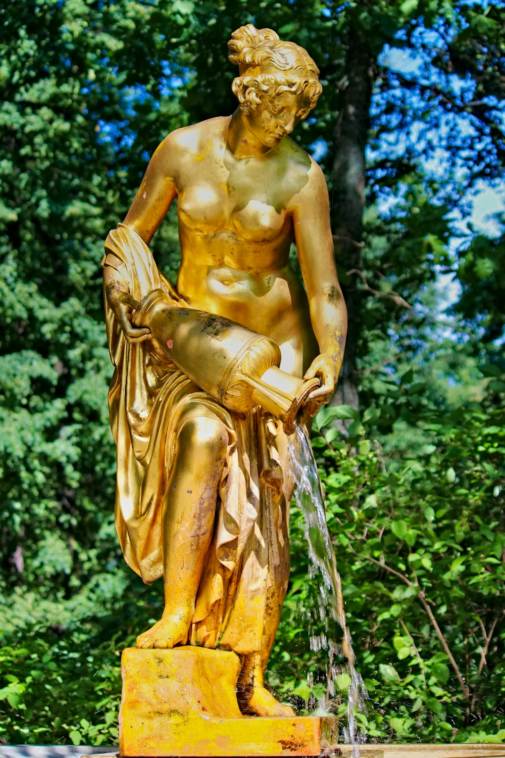 gold statue of a woman