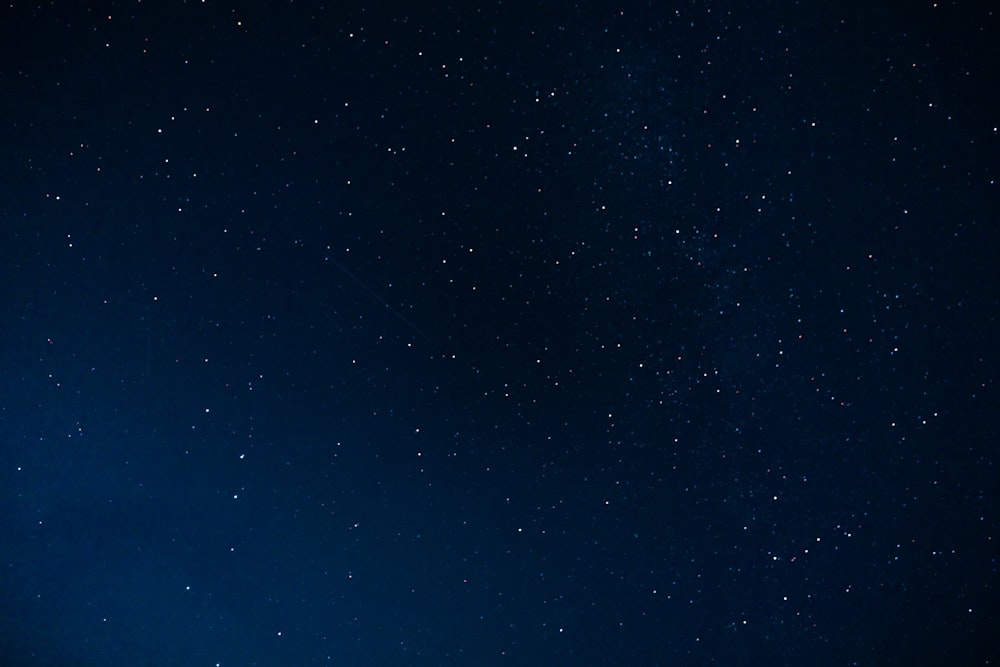 blue sky with stars during night time