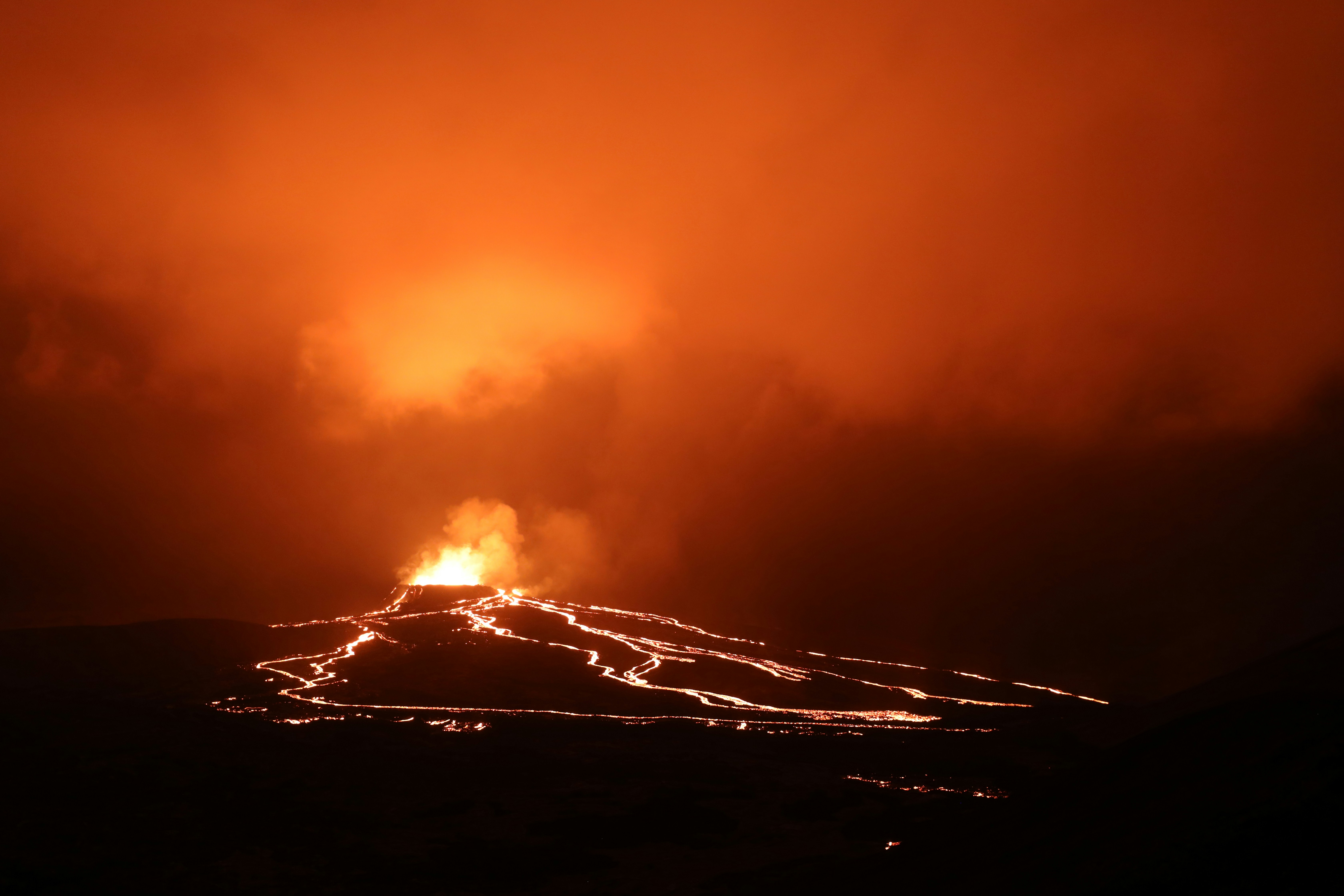 black and white mountain under orange sky, The volcanic eruption at Geldingadalir, Fagradalsfjall.
