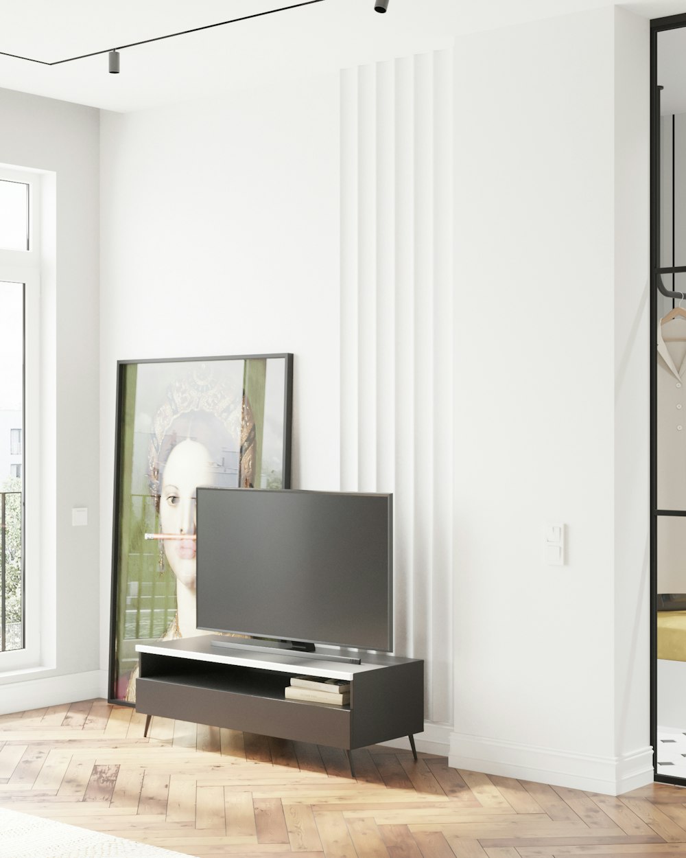 black flat screen tv on brown wooden table