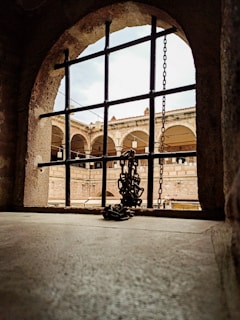black metal window frame during daytime