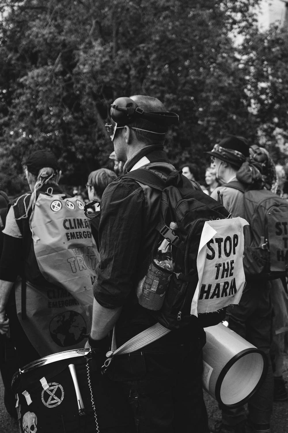 grayscale photo of police men standing on road