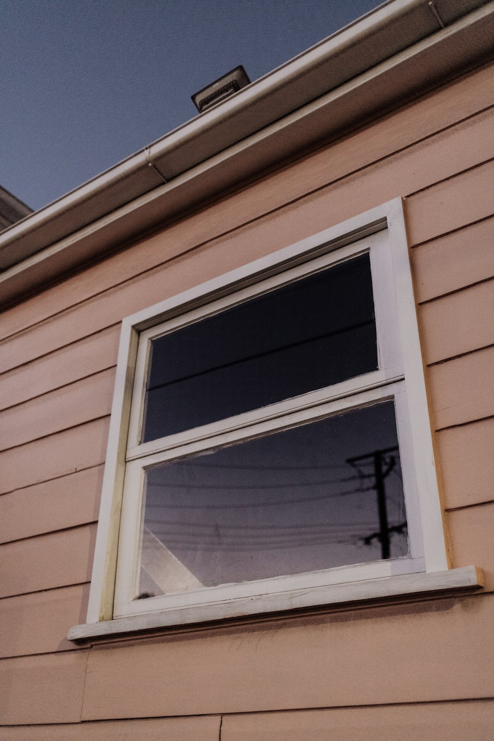 white wooden framed glass window