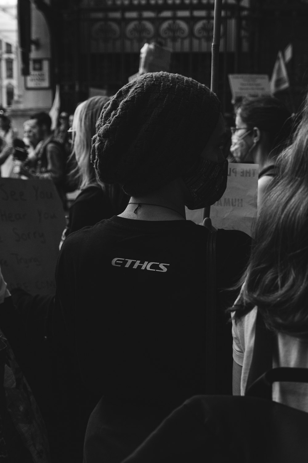 grayscale photo of man and woman standing