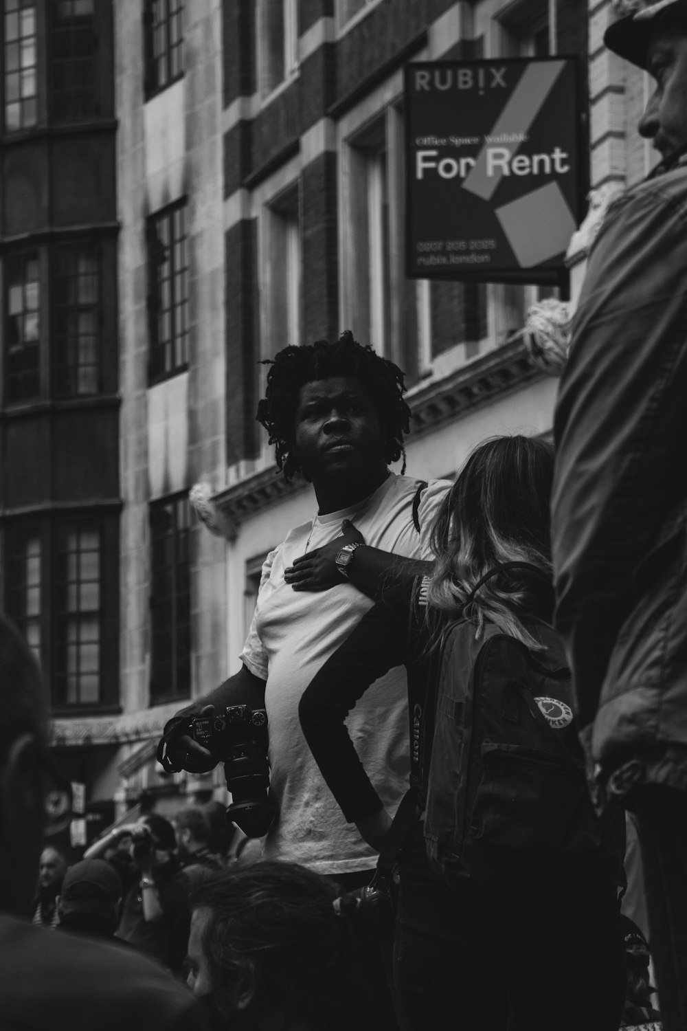 grayscale photo of woman in jacket