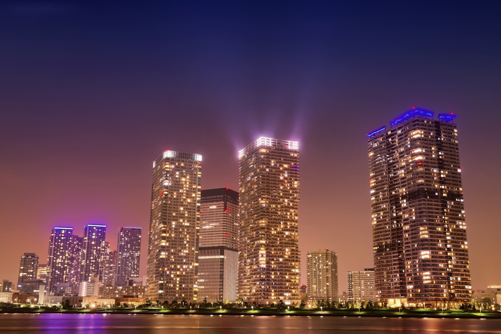 city skyline during night time