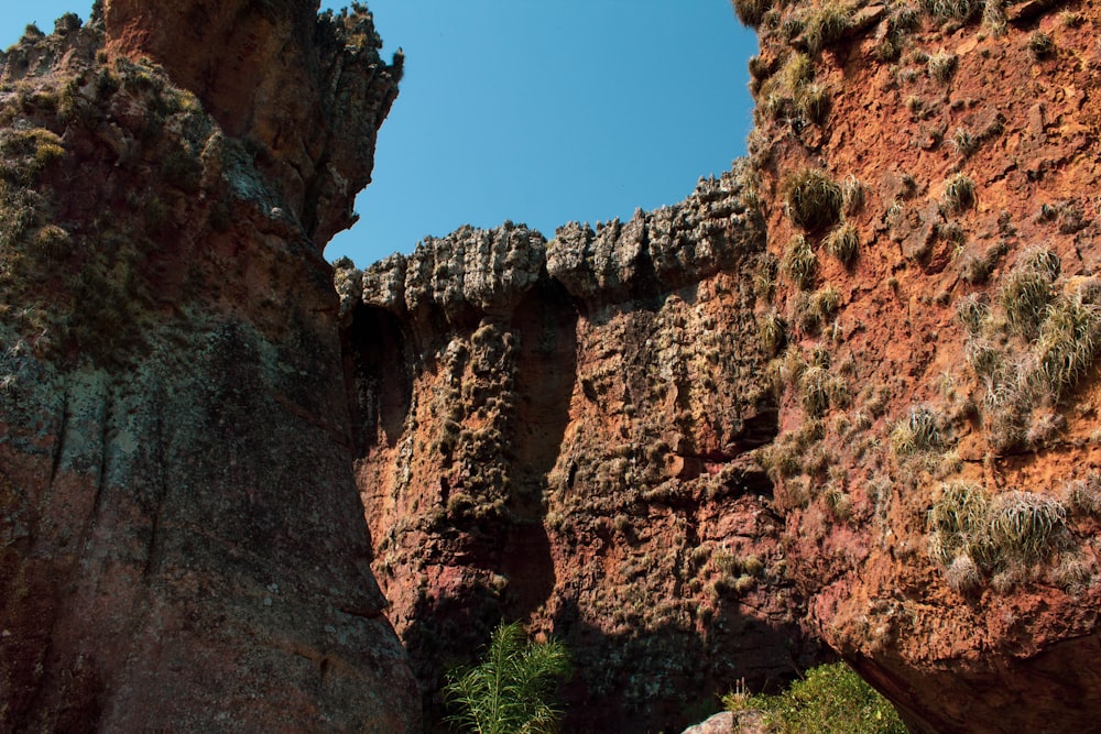 brown rock formation under blue sky during daytime