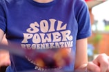person in blue crew neck t-shirt