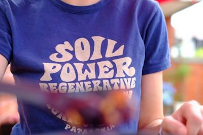 person in blue crew neck t-shirt