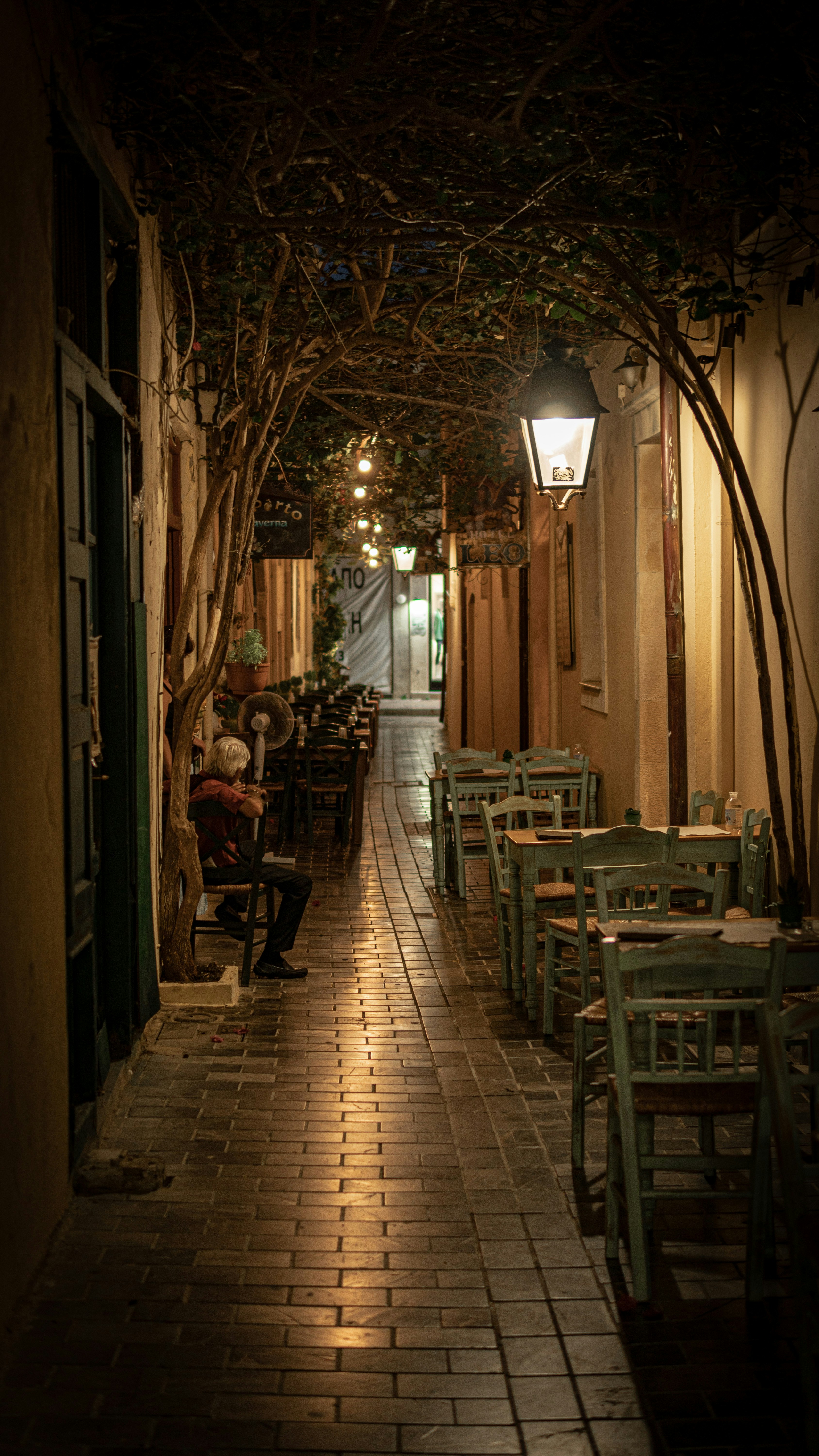 brown wooden chairs and tables in room