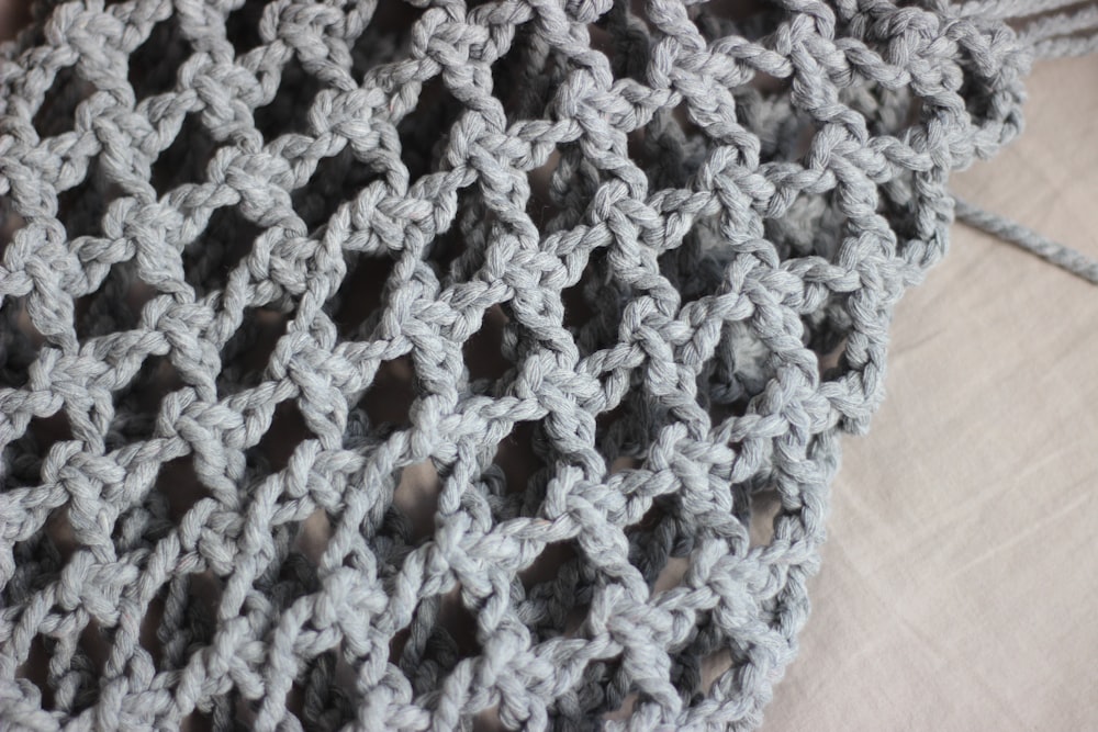 gray and white knit textile