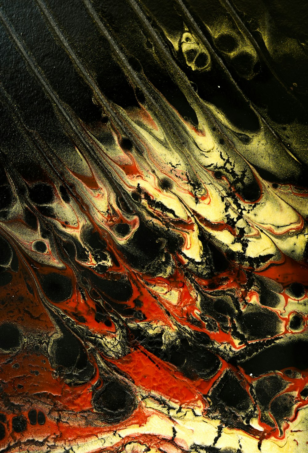 a close up of a red and black substance