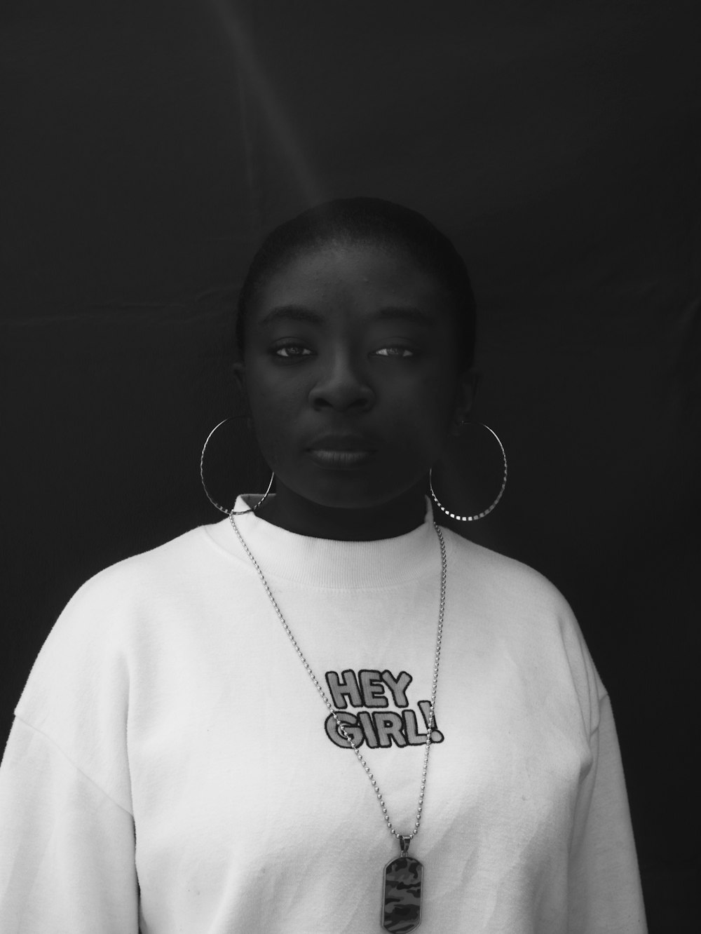 grayscale photo of boy in crew neck shirt