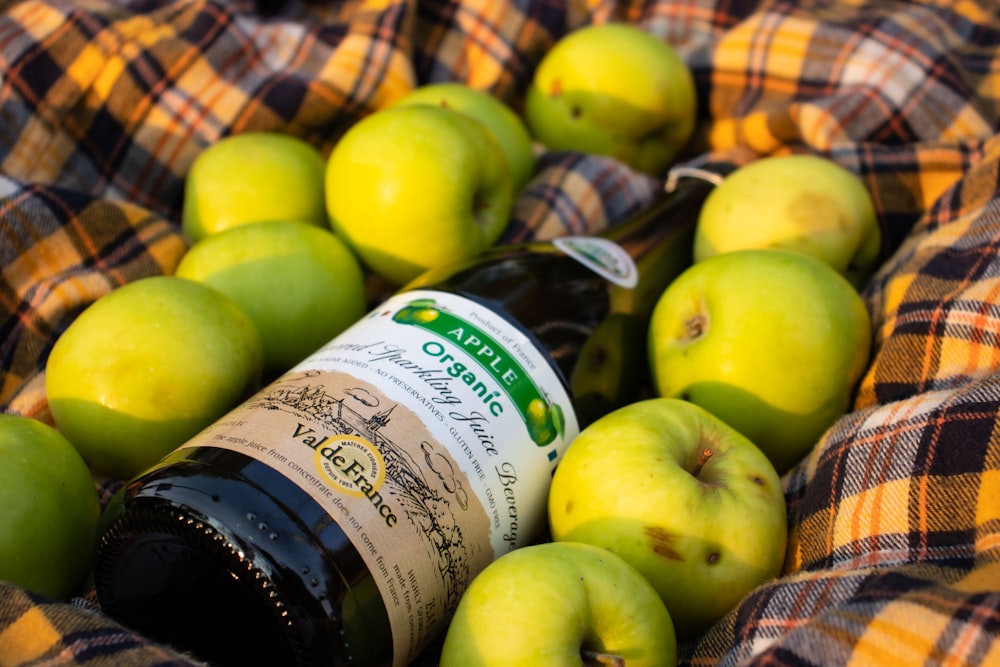 green apples on brown wooden table