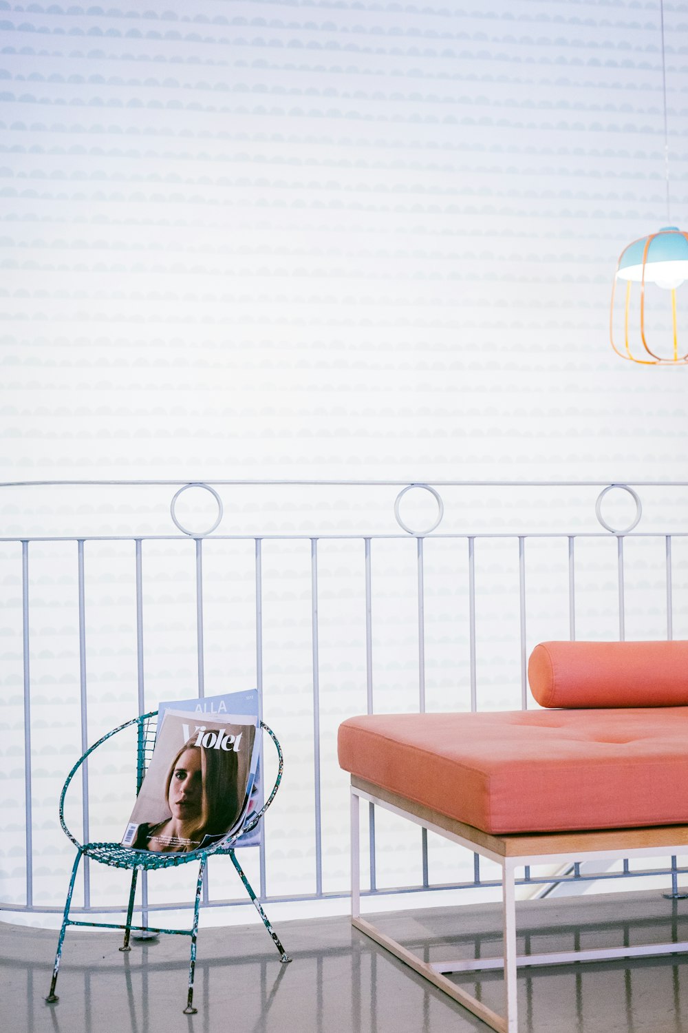 orange couch with throw pillows