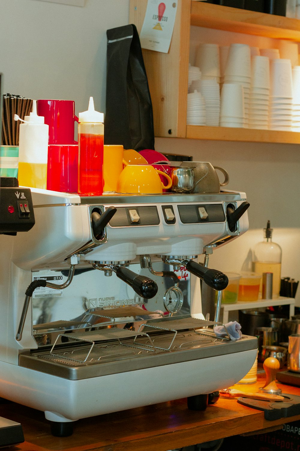 stainless steel espresso machine on table