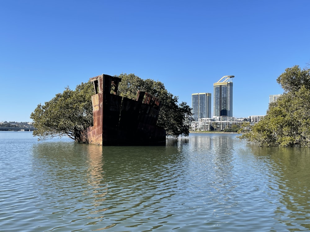 brown concrete building near body of water during daytime