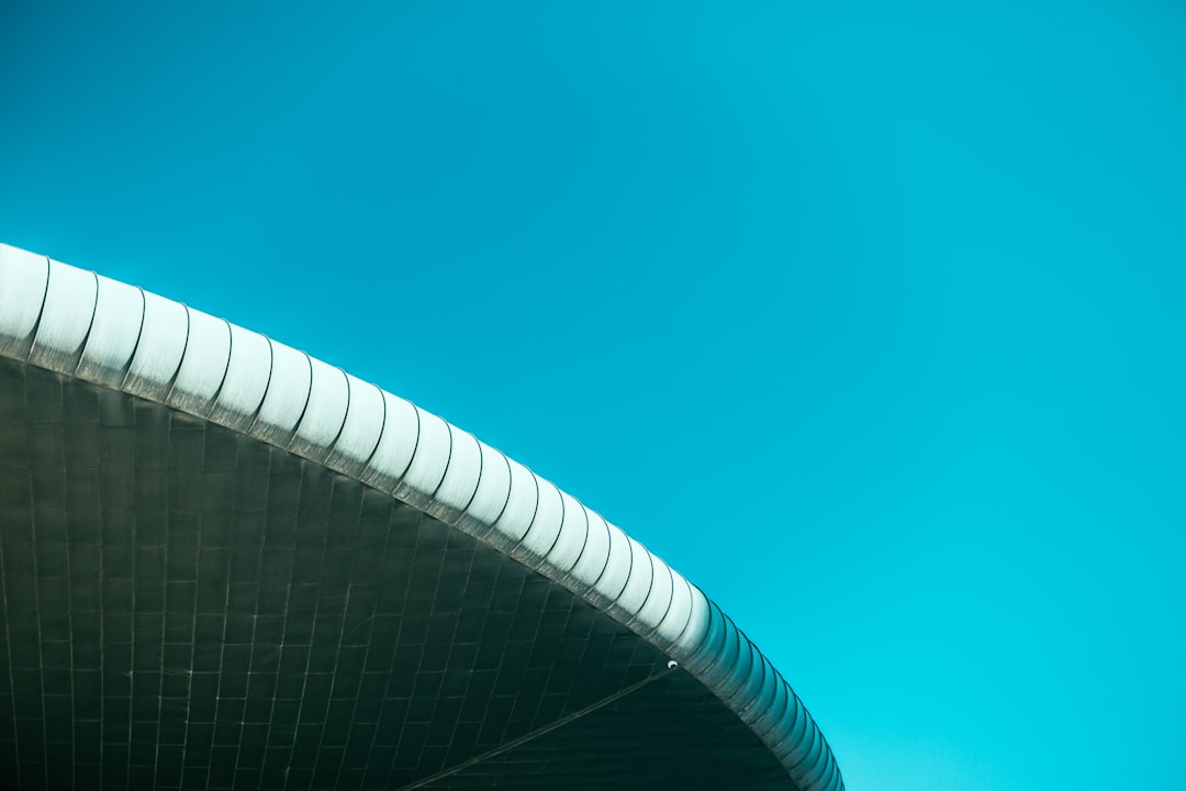 white concrete building under blue sky during daytime