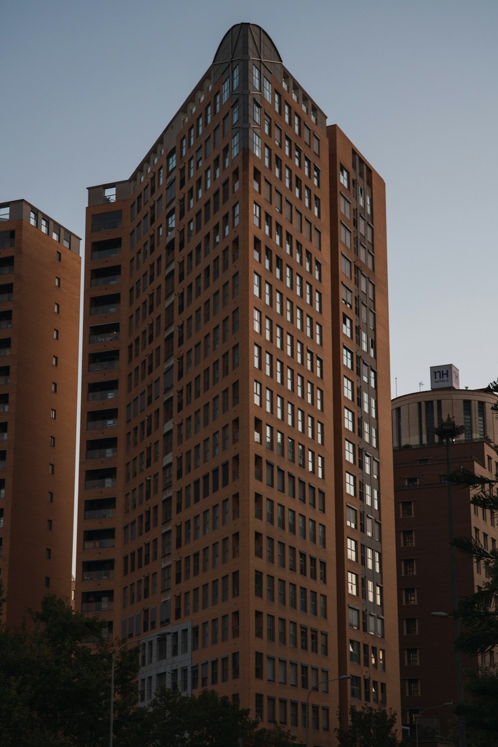 brown concrete building under blue sky during daytime