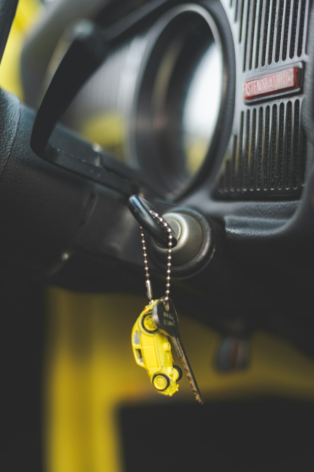 black and yellow car key