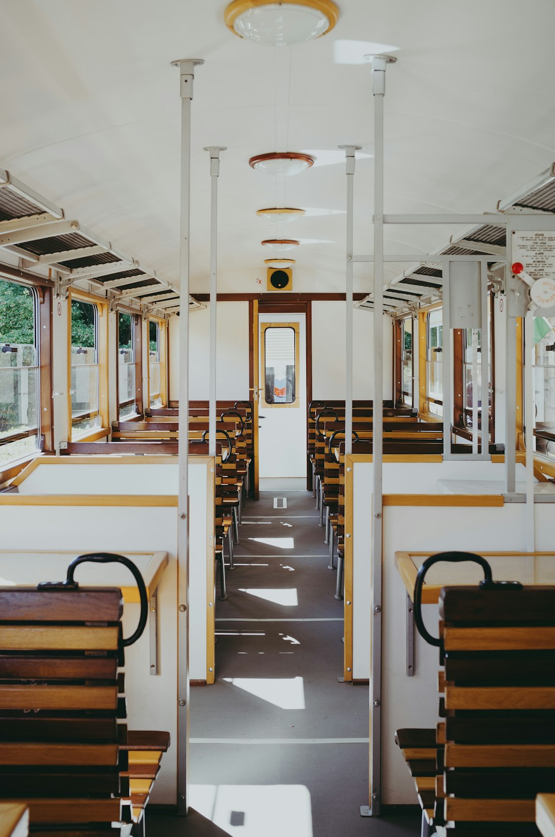 white and brown train interior