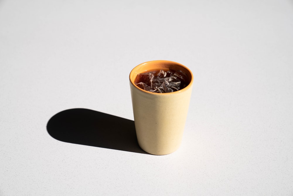 white ceramic mug with coffee