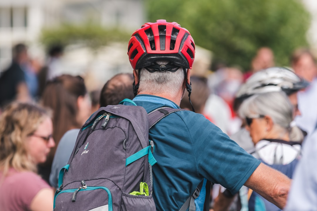 man in blue long sleeve shirt wearing blue helmet