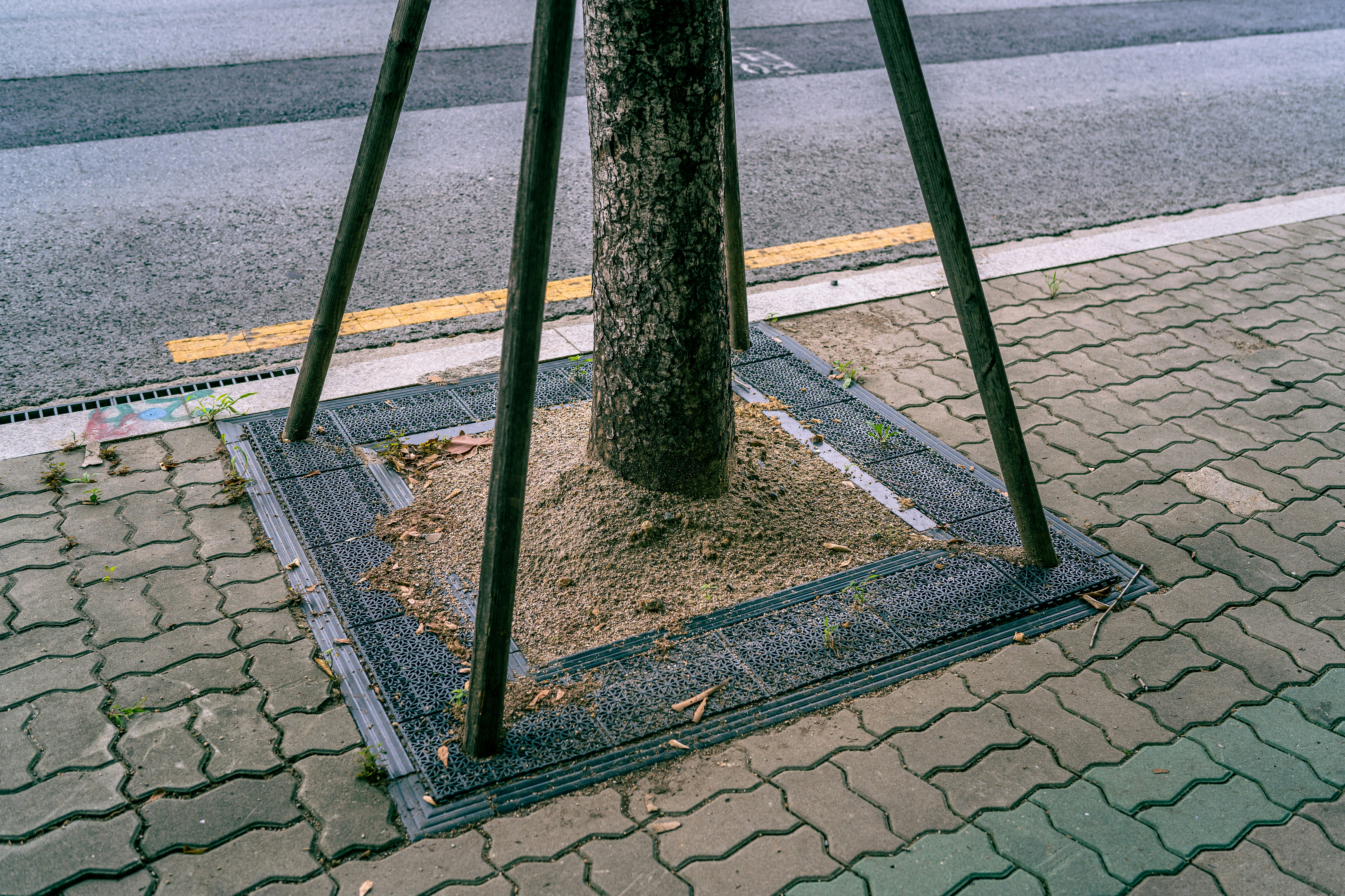black metal stand on gray concrete floor