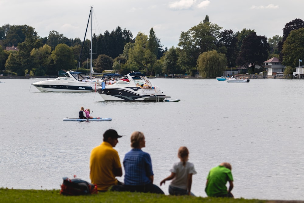 people riding on boat on water during daytime