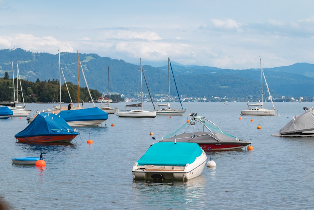 green and brown boat on body of water during daytime