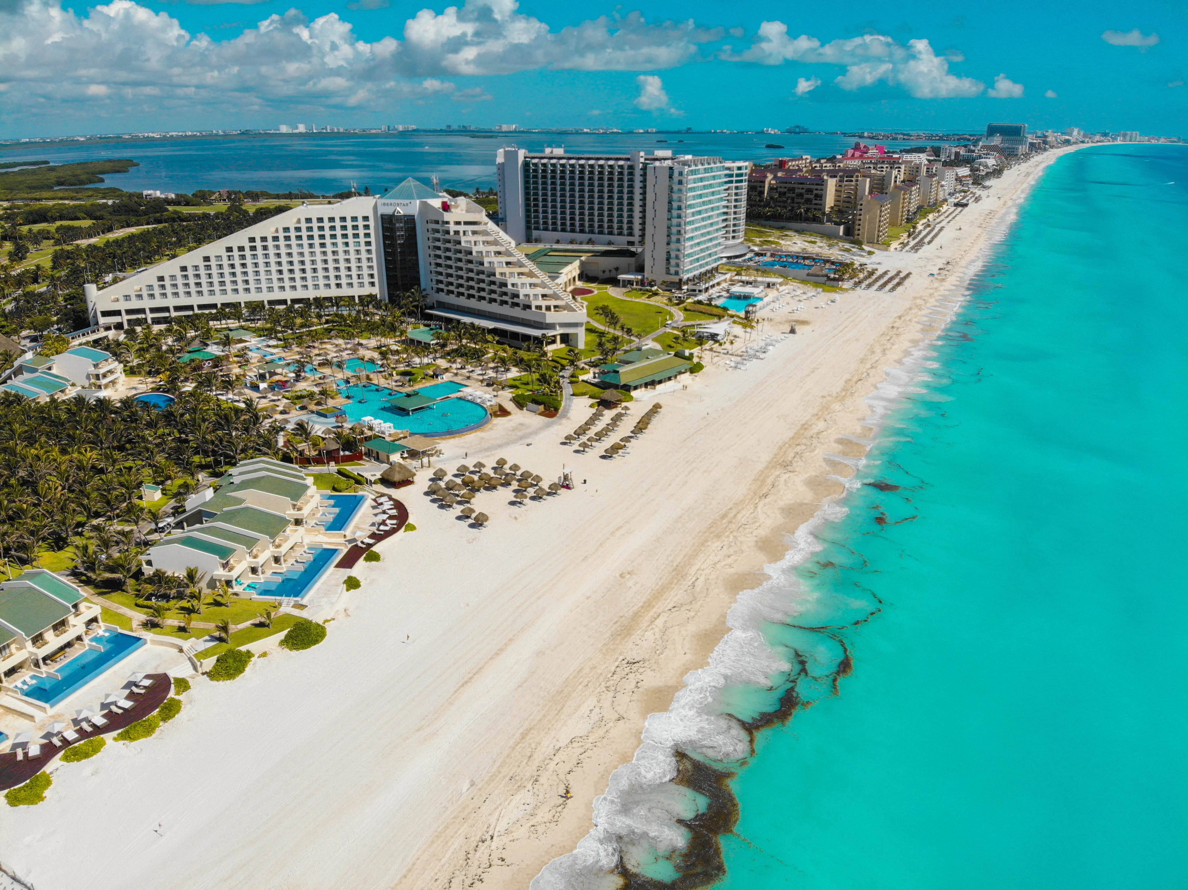 Luxury resort pool overlooking the Caribbean Sea in Cancun Mexico