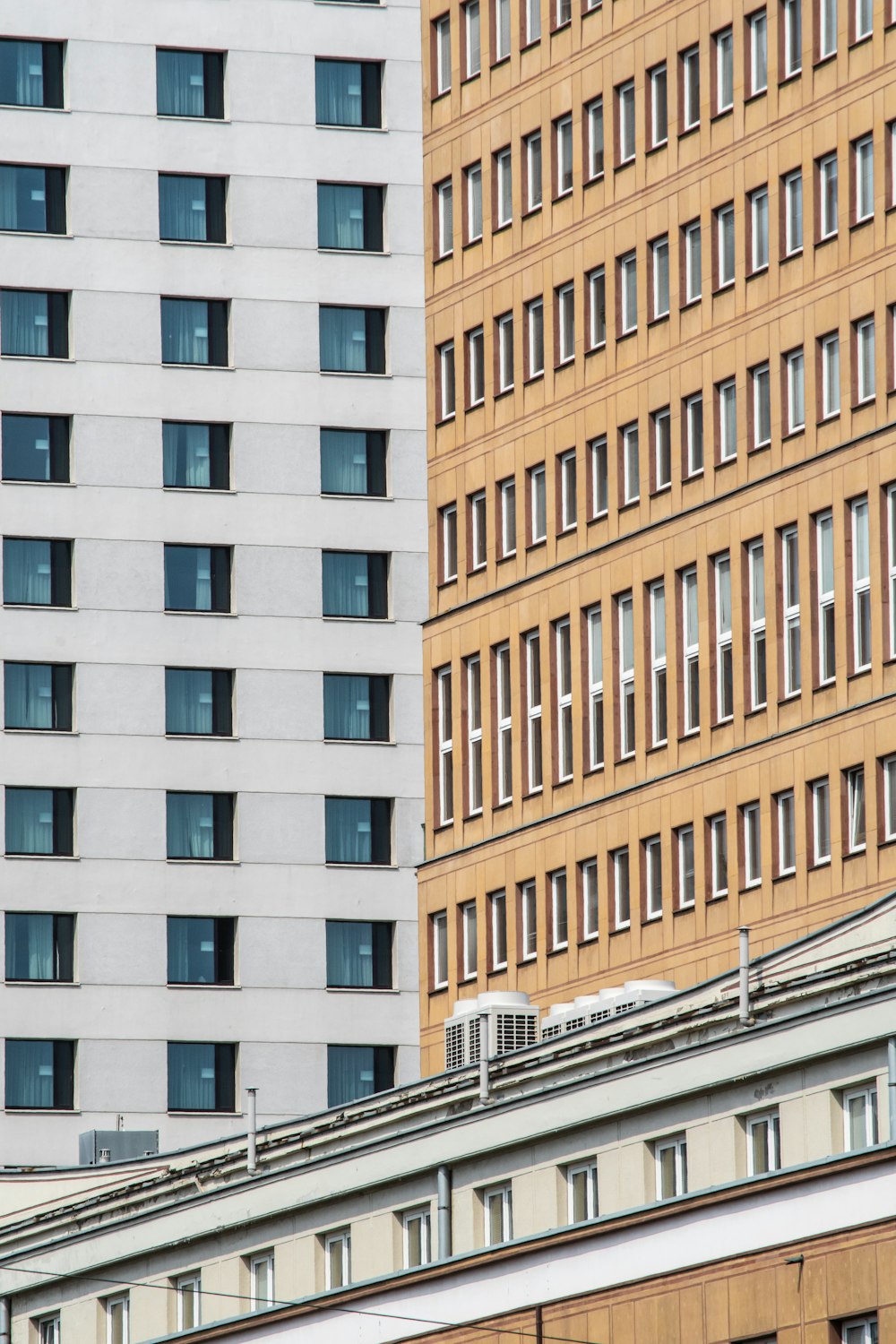 brown and white concrete building during daytime