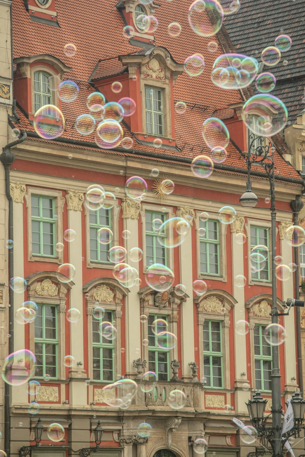 brown concrete building with bubbles