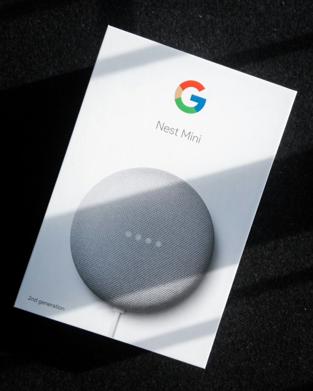 white google home mini box