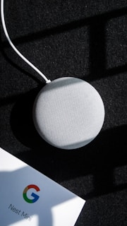white round plastic on black textile