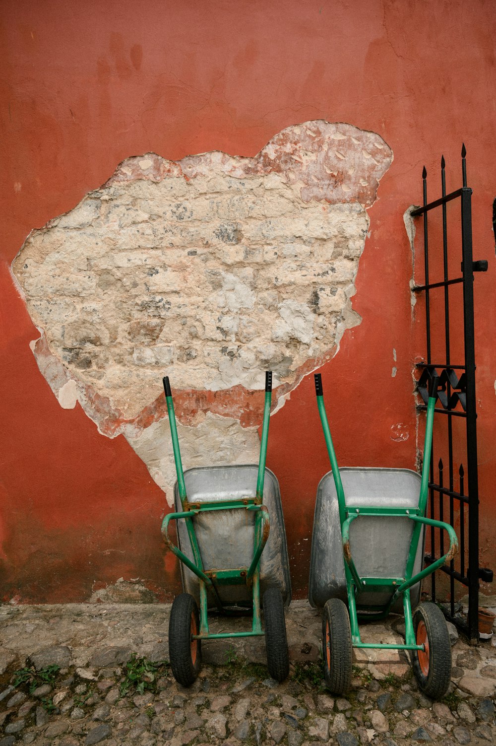 green and gray metal chair