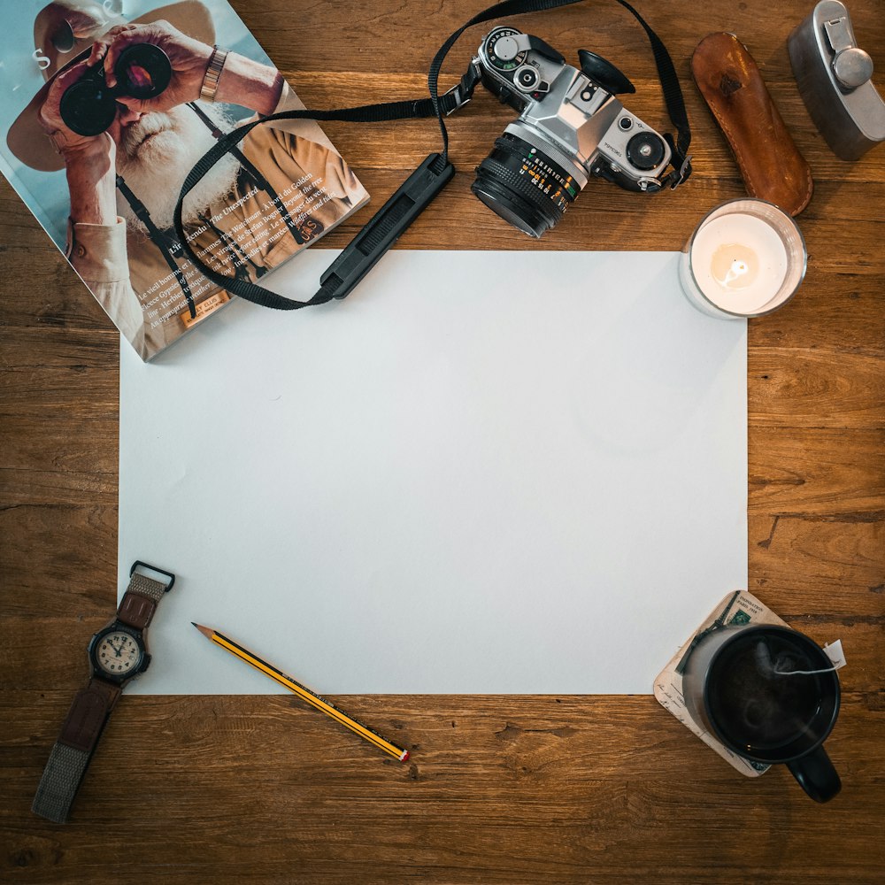 black dslr camera on white table