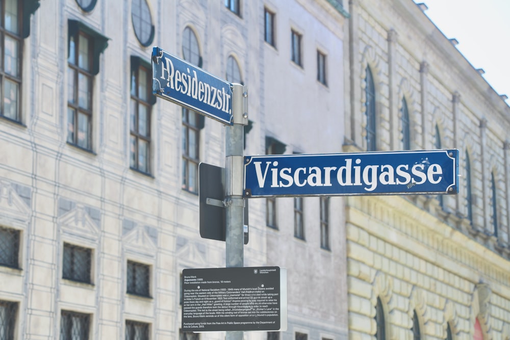 blue and white street sign