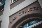 a law office sign on the side of a building