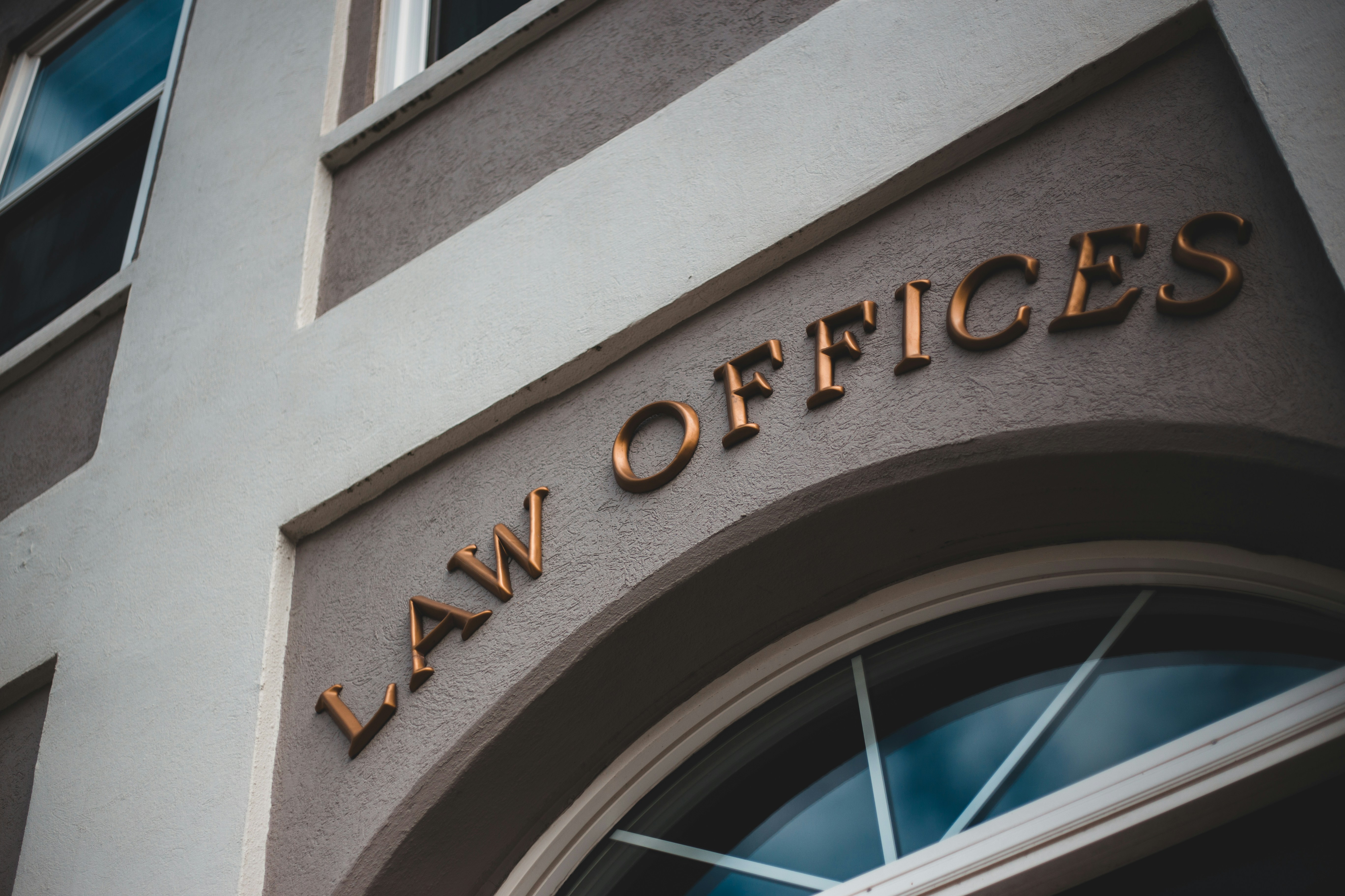 a law office sign on the side of a building